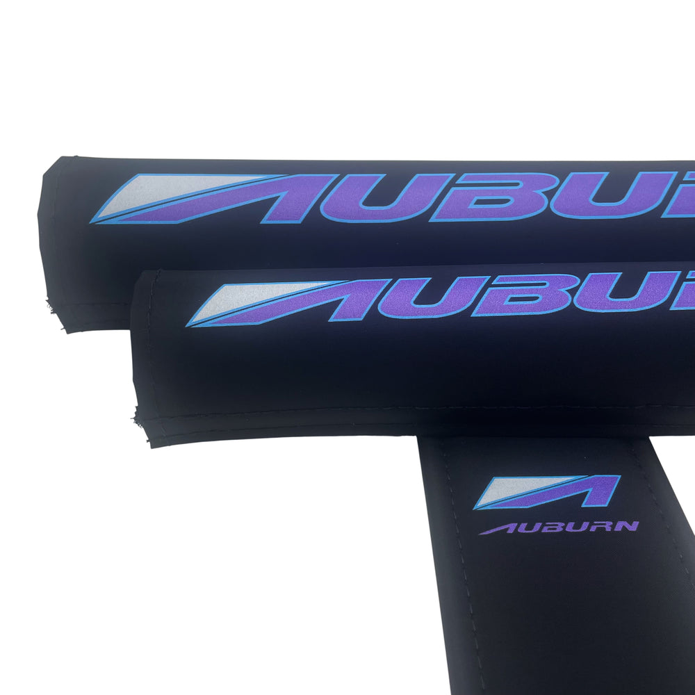 3rd generation Auburn BMX Pad set purple and cyan on black smooth nylon velcro closure