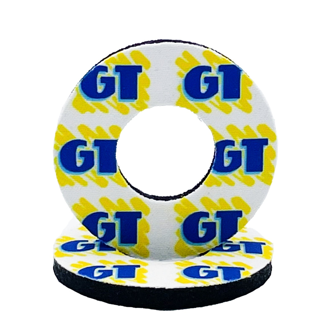 GT BMX grip donuts made by flite freestyle white background yellow scribble with blue gt logo sold in a set of 2 officially licensed  