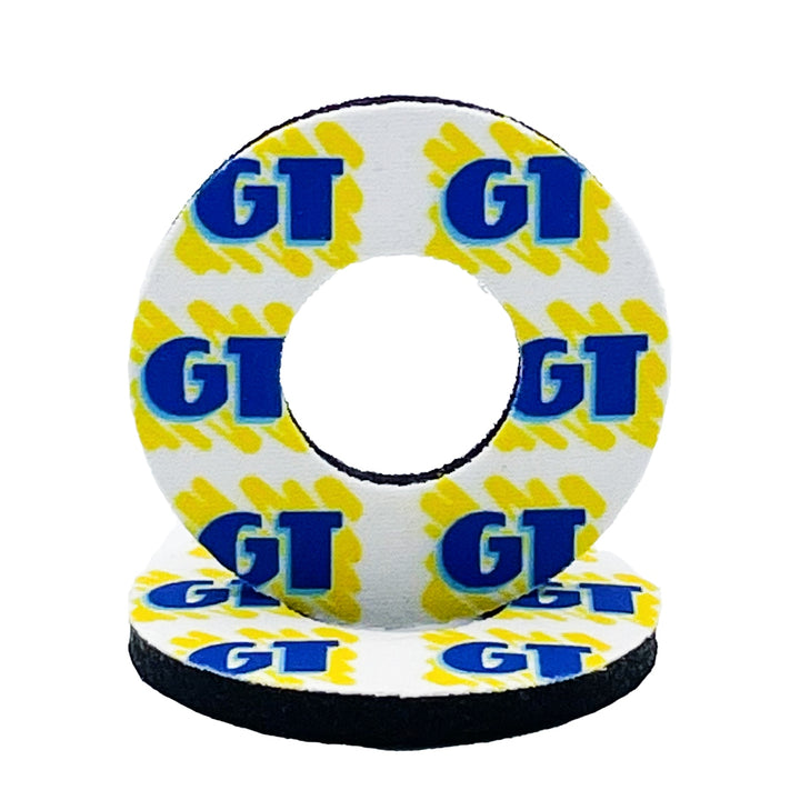 GT BMX grip donuts made by flite freestyle white background yellow scribble with blue gt logo sold in a set of 2 officially licensed  