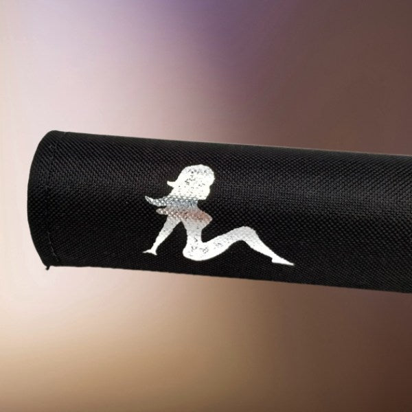 Close up detail of metallic chrome lady on black pad