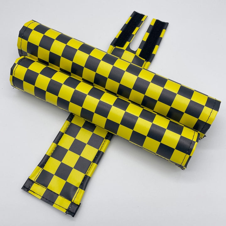Black and yellow checker 3 piece BMX pad set made by flite bmx FliteBMX extra wide SE handlebar pad