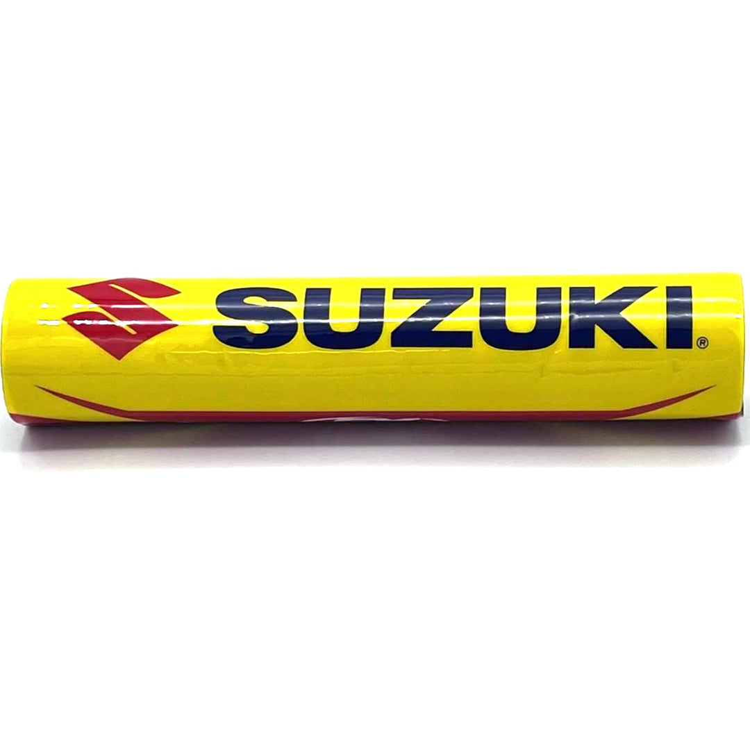 Yellow bar pad with Suzuki symbol in red.