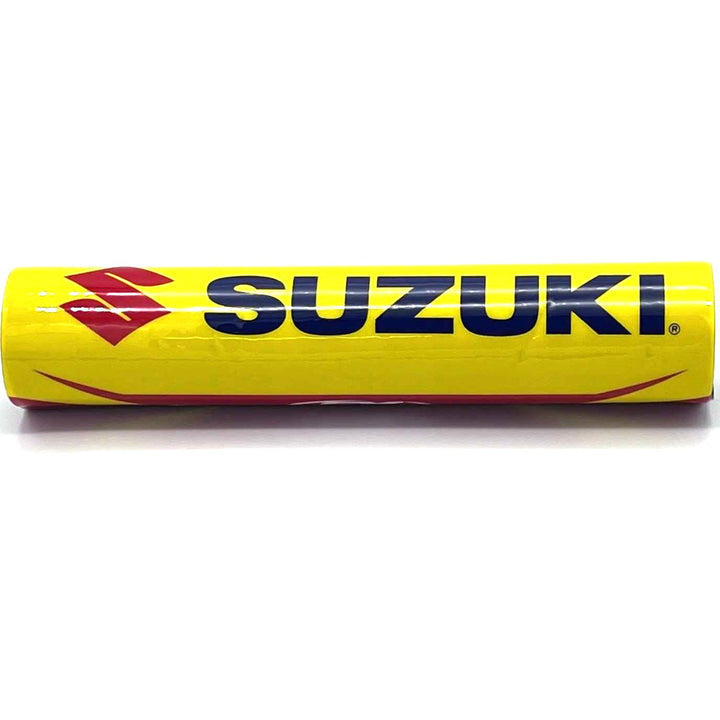 Yellow bar pad with Suzuki symbol in red.