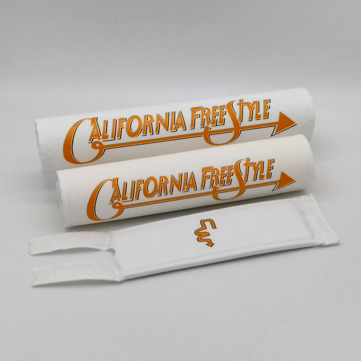 California FreeStyle 3 piece BMX Pad set by Flite licensed CW Double cross bar - fits CA Freestyle double bars.  Frame bar stem pads white textured nylon fabric with orange logo 