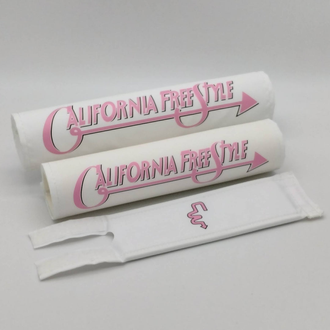 California FreeStyle 3 piece BMX Pad set by Flite licensed CW Double cross bar - fits CA Freestyle double bars.  Frame bar stem pads white textured nylon fabric with pink  logo 